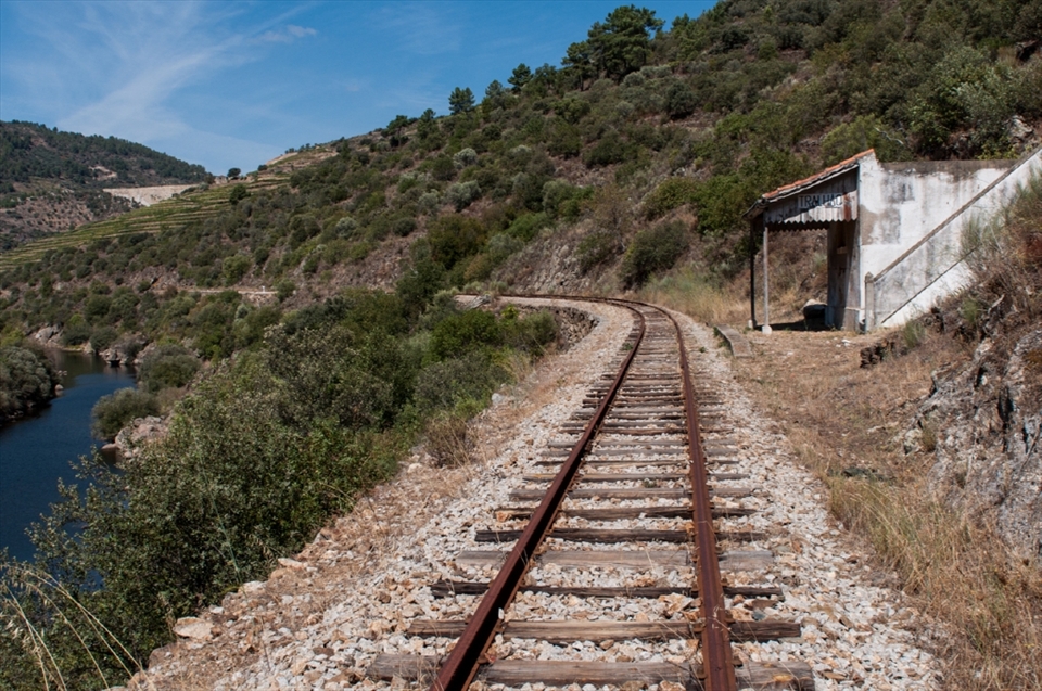 Time stopped here, where old train stations wait for the water to cover it
