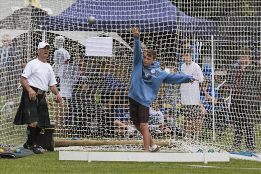 Junior Highland Games competitors try out traditional weight throwing