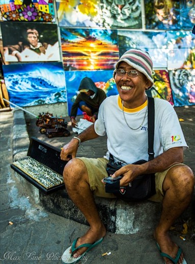 Would you like to buy a ring? This guy was was selling rings on the beach. 