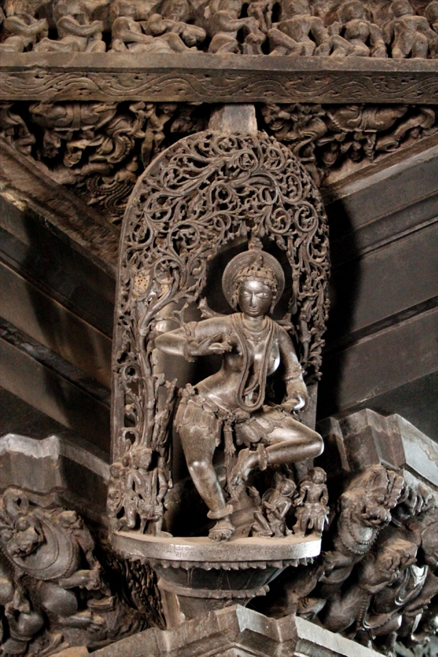 A sculpture showing a woman engaged in a dance form.
The channakeshava temple is more known for the “SHILABALIKE” (Images of woman carved in stone) all around the temple each one engaged in different activities, These sculptures even have interesting names such “SHUKA BHASHINI”, “DARPAN SUNDAR”.

It is said that the people hid the temple from invaders by covering it up completely under sand due to which it is still intact.