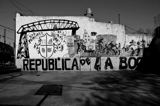 La Boca-not really a neighborhood of Buenos Aires, but a city within the city. A world of immigrants, a perfect mix of cultures, of European and native features that have been transmitted through time and have created micro-worlds. Joaquin lives in the streets of this world of the worlds, and after walking through them with him for a while, he plays with me and hides himself inside his Boca.