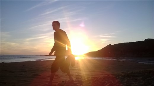 My friend walking by the beautiful sunset in Co.Donegal.