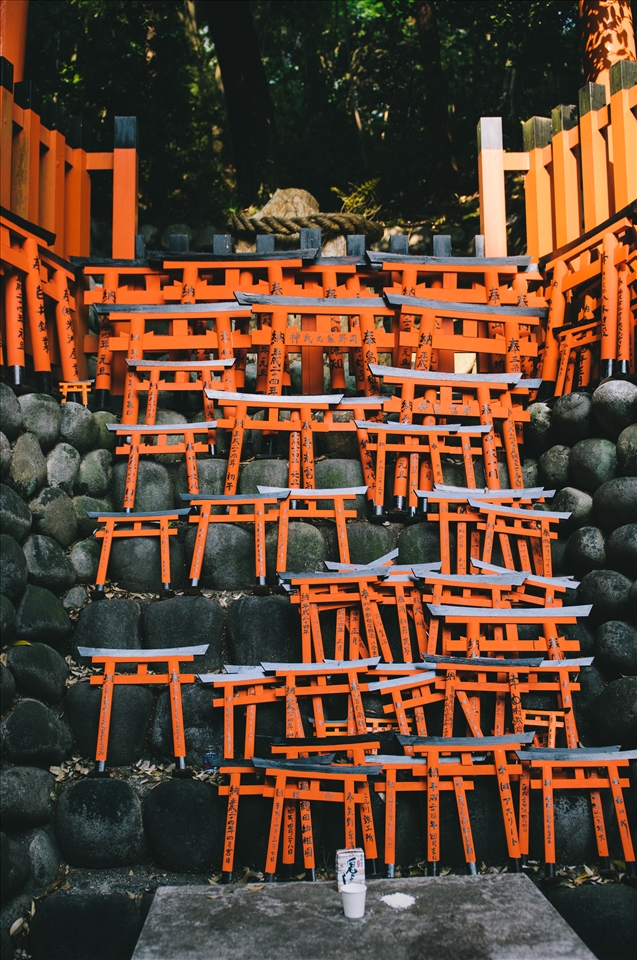 The road through Fushimi Inari Shrine is littered with smaller shrines along the way, decorated with these miniature red torii gates left by visitors.