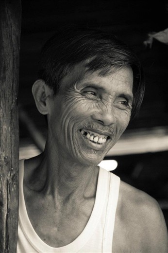 Cold as Ice - He is known as the Ice man, getting up with the sun to make ice blocks which are rushed down to the fishing village to keep the daily catch cool in the hot Hoi An sun. This image was captured just after he told us he wishes he was fatter like us because then his wrinkles wouldn't show. 