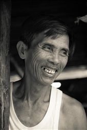 Cold as Ice - He is known as the Ice man, getting up with the sun to make ice blocks which are rushed down to the fishing village to keep the daily catch cool in the hot Hoi An sun. This image was captured just after he told us he wishes he was fatter like us because then his wrinkles wouldn't show. : by melis2117, Views[557]