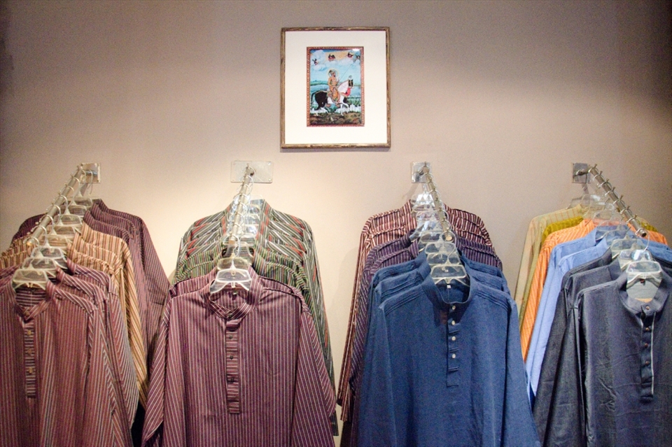 Shirts in Gulshan shop: contrast of street stalls of Dhaka, and the divide between those with and those without. Showing the different identities one person can adopt. 