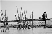 Tonle Sap Lake. January. 2013. Men putting up scaffolds for a boat. I saved up to photograph the Angkor temples in Cambodia  but the villagers of Tonle Sap stole my heart. I want to go back someday and spend more time photographing the people and learning about their culture.
: by melissag, Views[366]