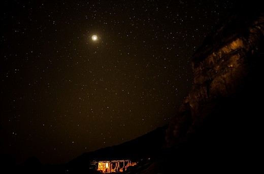 After midnight Chatters: i camped near top of St. catherine mountain waiting for the sun rise and experimenting with Stars photography, Those guys grapped my attension; sharing little warm place and surrounded by tottal darkness and a whole universe. 

Dahab is a quite small city in south Sinai, it is a touristic attraction for all nature lovers, and these 5 photos are not pure nature photos! they all have some human touch, telling the story of the enormous peacefully beautiful nature enclosing and containing the limited and balanced human manipulation; opposite to what we see in urban areas and huge modern cities - where we cannot watch stars, or sunset, or even enjoy a quite time!
