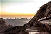 Morning Sinai: just at dawn, from the spot i picked to camp the night near top of St. Catherine mountain, showing the misty wet rock stairs made by humans to reach the top of the mountain, and the graded effect of mountain tops and horizon of clear sky in south sinai. it looked like high building roofs! 

Dahab is a quite small city in south Sinai, it is a touristic attraction for all nature lovers, and these 5 photos are not pure nature photos! they all have some human touch, telling the story of the enormous peacefully beautiful nature enclosing and containing the limited and balanced human manipulation; opposite to what we see in urban areas and huge modern cities - where we cannot watch stars, or sunset, or even enjoy a quite time!
: by melmahdi, Views[1873]