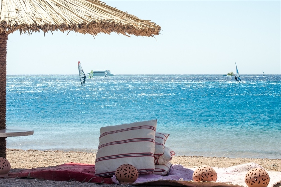 Summer Shadow: what is better than enjoying the sun on the Red sea, and water activities in a bedouin syle? Lagona beach is the best distenation to clear your mind and enjoy the sun in the most quite beach i ever been.

Dahab is a quite small city in south Sinai, it is a touristic attraction for all nature lovers, and these 5 photos are not pure nature photos! they all have some human touch, telling the story of the enormous peacefully beautiful nature enclosing and containing the limited and balanced human manipulation; opposite to what we see in urban areas and huge modern cities - where we cannot watch stars, or sunset, or even enjoy a quite time!
