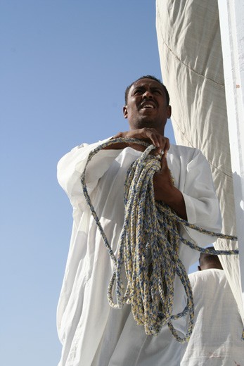 The galabia is the traditional garment for Egyptians.  Made from thin white Egyptian cotton, it is the perfect attire for working a long day on the boats in the sun.