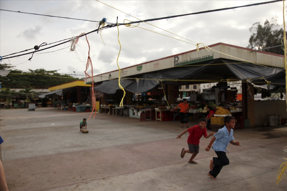 Children play at the market in San Antonio