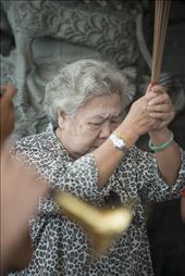 Hundreds of Yap clan members have flocked to the smoke-shrouded Yap Kongsi Temple in Georgetown, Penang, to throw a birthday party. The birthday boy is not one of the dozens of people obstructing traffic, praying or burning wads of paper money, but Hoay Che Chun Wang, the patron deity of the clan. He turns 800 today. United by a shared Hokkien Chinese heritage and a proud history on the famously multicultural Malaysian island, the clan revellers count two mosques, a Hindu temple, a Synagogue and Christian Church among their neighbours. : by michaelcook-altaiworldphoto, Views[969]