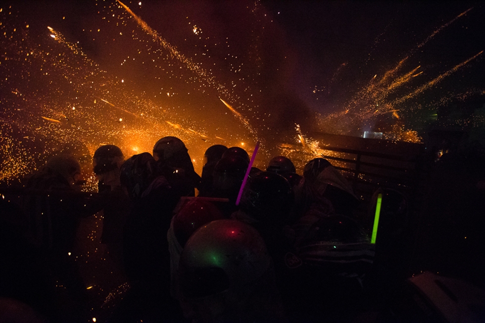 A rack of thousands of bottle rockets are set off.