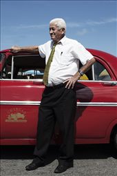 Ernesto – A successful state (tourist) taxi owner. Driving a taxi in Cuba is a lucrative business. Earning many times more than a doctor.: by michaelwickham, Views[1011]