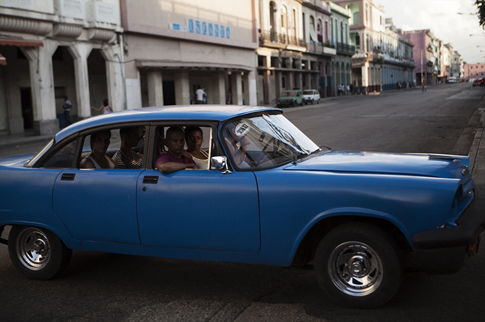 A packed Collectivos, privately owned taxis that travel on scheduled routes, picking up and dropping of all the people they can along the way.