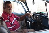 Cars are gold in Cuba.  Romario pictured inherited this car from his brother; it has been in the same family for more than 40 years. Kept alive with whatever parts can be found.: by michaelwickham, Views[851]