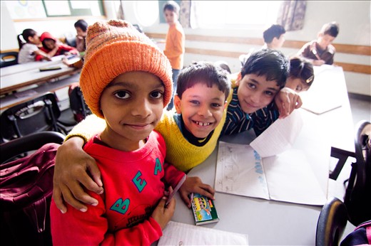 The little boy in the orange beanie had been drawing a yellow school bus when we walked into his classroom at The Hope Project. There were fifteen of us Canadians crowded into their small classroom. He looked around at us nervously but continued to draw glancing at us from time to time. I asked him what he was drawing but his English was not very good. I took a video of his drawing and showed it to him. A small smile crept over his face and his two neighbours jumped to get a better look. They all showed me their pictures and watched in awe as they saw their own drawings on my little viewscreen.