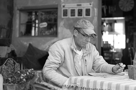 One of the pleasures experienced when visiting Riebeek Kasteel is that no one cares about time but they do about each other and when you sit down in a coffee shop or restaurant the table is yours for as long as you want it. For me, this picture epitomise that timeless feeling. The frayed hat; a word puzzle and not suduko; a newspaper not a tablet. Converting it to black and white was an obvious route to take.
