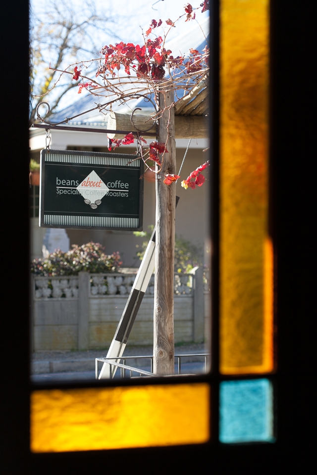 Riebeek Kasteel is big on small business – you won't find any chain stores here (apart from a general grocer).  This is a little (and it is really tiny) coffee shop that roast and ground their own coffee. Another thing about this scene that enticed me into pressing the shutter was the way the glass stained window insert framed the shop-name sign.