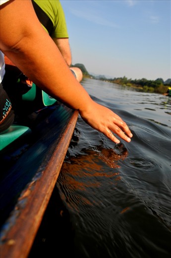 This is my friend Joy's hands as we were on our way back from The Perfume Pagoda. As beautiful and cultural as the experience was, the best part of the trip was probably getting a phone call from our travel agent in the middle of the winding river. I felt like I was shooting one of those tourism ads. It was amazing. 