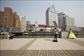 Evolving fashion: A bridal fashion shoot takes place on The Bund, Shanghai. Traditionally, Chinese brides wore red, a colour associated with luck and prosperity. The colour white, symbolising death and mourning, was considered taboo. Nowadays, white, western-style dresses are popular as a symbol of middle class status and progressive ideals.: by micro, Views[1385]