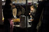 A lady finds it hard to choose wich chinese dish to eat. At Food Hall market in : by miguelsimoes, Views[288]