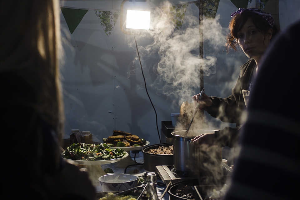 A cook at the Back Yard in Brick Lane food market stirs a delicious stew.