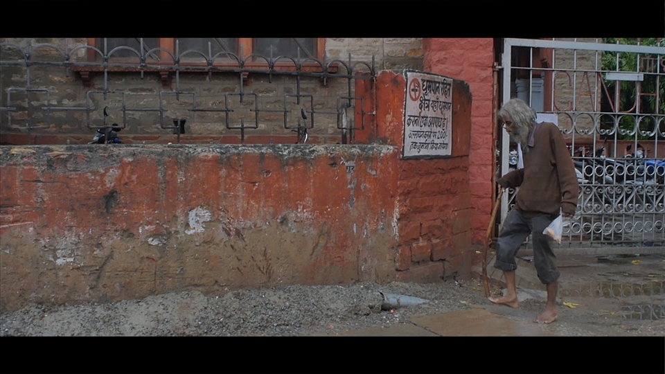 Old man with walking stick