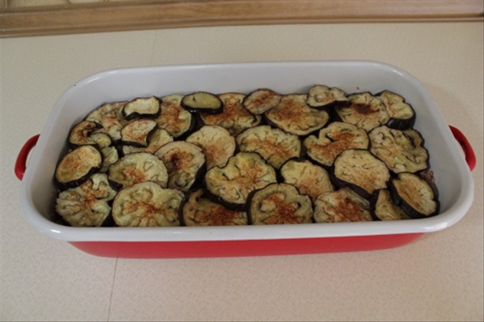Cover with eggplant slices