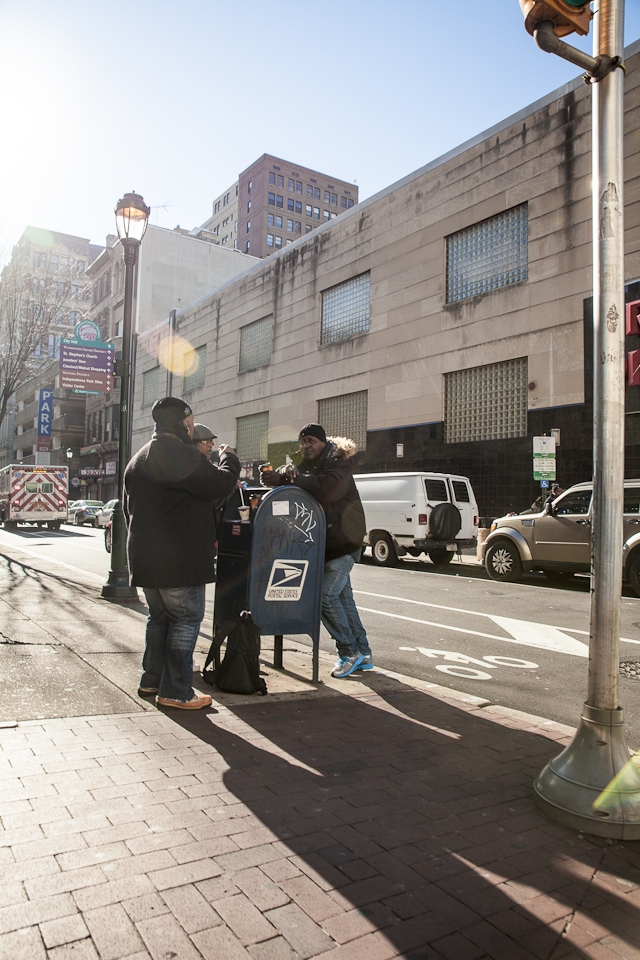 Any St. and a Mailbox.

I’ve never seen people hanging out at a mailbox let alone use it to rest a mid-day coffee. Being in Philadelphia it was a must to find the countries best Philly cheese steak. My theory goes that if you search for great food you’ll find a great photo. “Excuse me, where is the best cheese steak in Philly?” “Jim’s … since 1939!”

