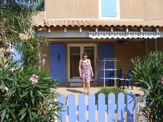 Christine outside the Beckett's house. 