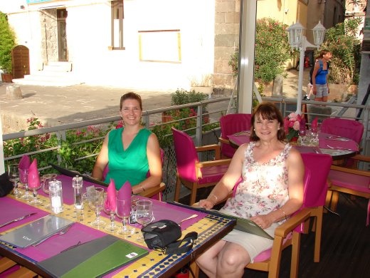Em and Christine at the restaurant for dinner. Very pretty and pink.