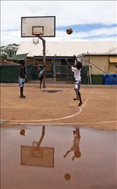 A group of local indigenous boys take time to throw down some hoops at Yirrkala. Local NGO and Corporate organisations are bringing together communities and cultures through sports in an effort to up skill the indigenous population, but it is a tough road to travel as the local schools have an average 30% attendance rate.: by milos, Views[1105]