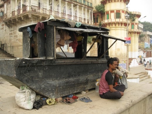 A small house made in a old boat  on the ghats on ganga , varansi waiting for his nirvana .
