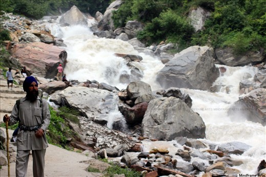 Walking by the Holy River Ganga. Relation between the man and the nature.