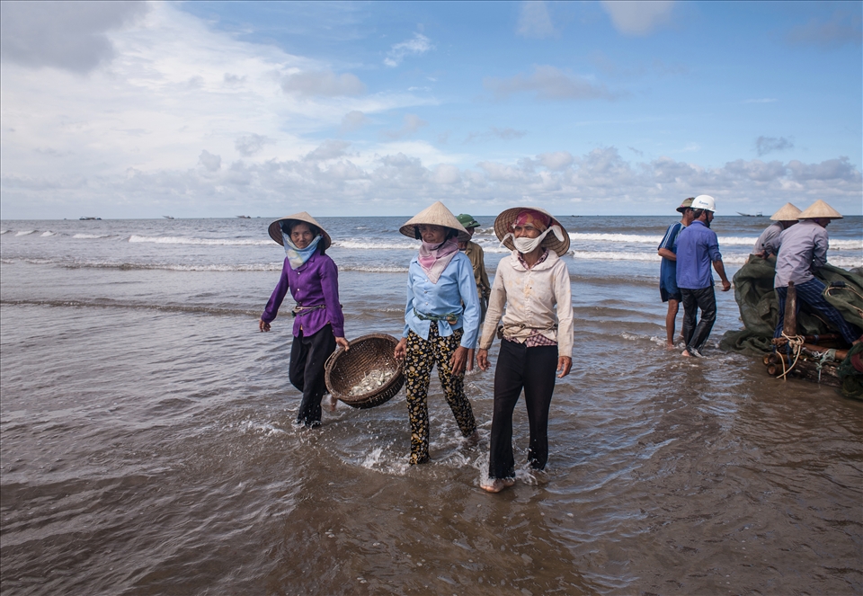 Even though they didn't harvest much, they still have a smile on their faces.