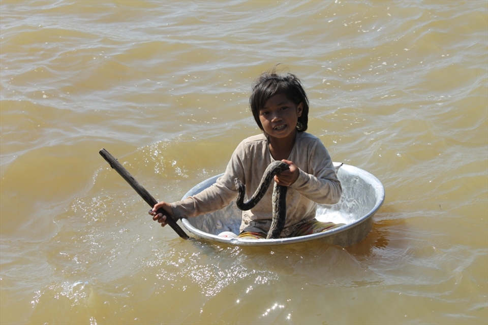 Children of the village would use tubs like a boat capturing attention.