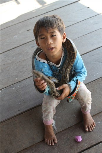 9 year old boy (clearly he does not look his age) and told me about life there.