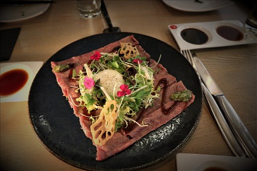 Aburi Beef Carpaccio, AAA sterling silver short rib, pickled wasabi, asian pear, organic hen's egg, jalapeno-garlic ponzu, organic baby greens. Unbelievable.