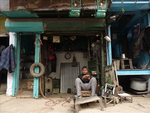 The caretaker - A boy keeps for his father's workshop in the absence of his father. Despite strict child labour laws, it is very common seeing children helping out in their family business, working into shops, doing daily wage jobs like waiting tables, doing dishes, selling cheap items etc. to support their families. Education takes a back seat when survival is on stake!