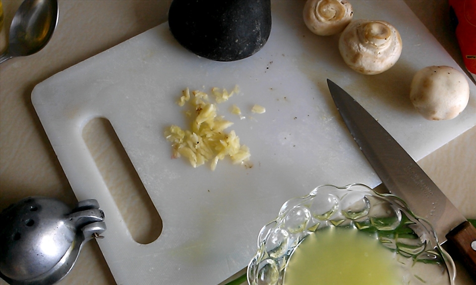 Crushed and then minced garlic