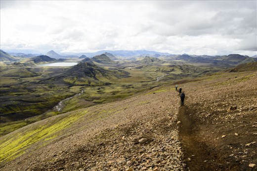 The trail down the Jökultungur is steep towards the dark papalagonite mountains.