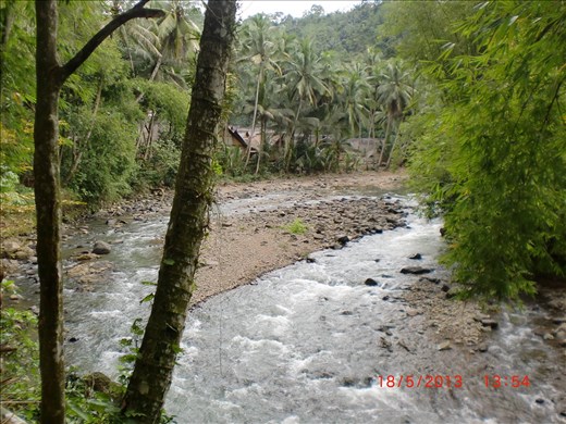 A river with sprinkling water. The Baduis protect their environment militantly.