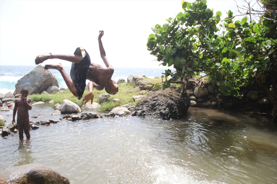 Life in the Kalinago territory, while materially poor is embodied by life close to the land, family, and leisure time. I stumbled across this beautiful river pool right by the ocean where the younger kids were swimming and doing tricks, while the older boys talked and washed clothes in the river. Clearly, while almost all the ingredients for a happy lifestyle can be found, money for education and serious health complications are not easily accessible.