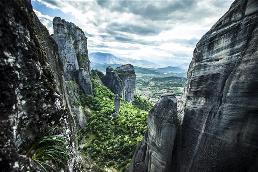 Among the giant walls of rock and sand. This lonely rock formation in the middle stands still as if it is a figure of a lonely soldier. The locals call this rock 