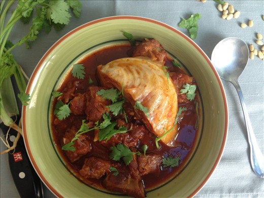 Pork ribs stew in tomato sauce with cabbage