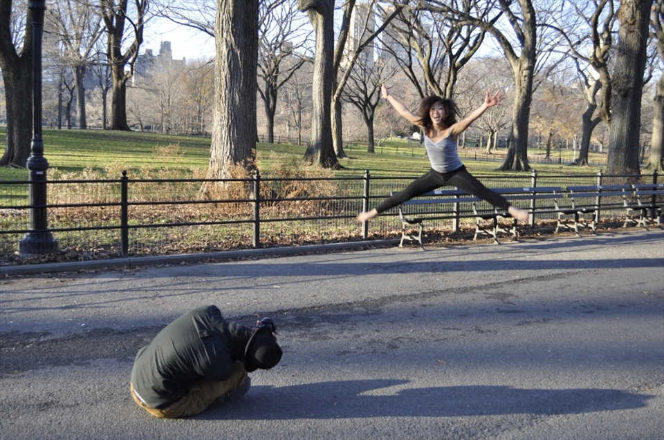 Central park in winter and about 4C, I was getting chilly just watching this poor girl jumping for the perfect shot over and over, a true professional and visually spectacular.