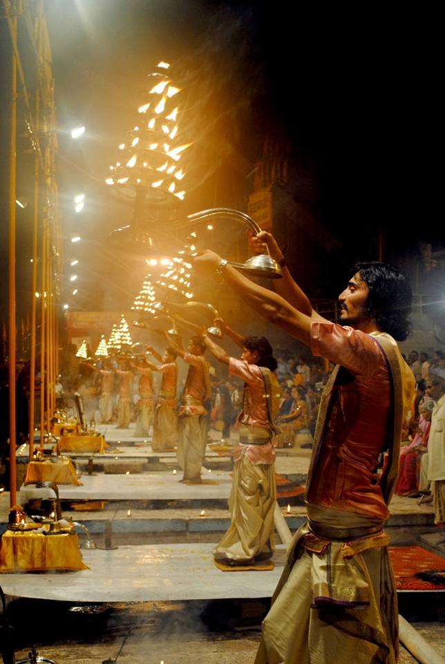 Hindu priests perform Ganga Aarti at Dashashwamedh Ghat in Varanasi. Aarti is a pleasant ritual of worshipping river Ganga by waving the lamp in circular fashion, in clockwise manner around the deity. Every evening, thousands of devotees from all around the world come to see this special worship.
