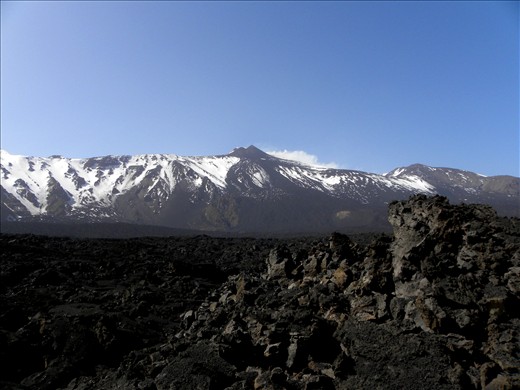 Sea of dark lava: When the slow wave of the fire stops to flow, it becomes an endless sea of sharp blades and only in the background you can see the mother of the stones